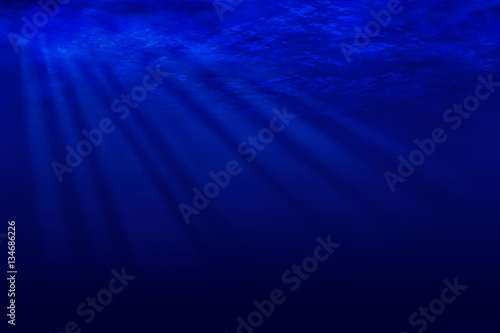 Rays of moonlight through the ocean water