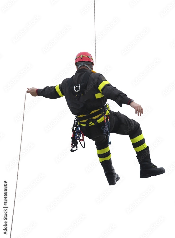 Fototapeta premium climber of firefighters with red helmet