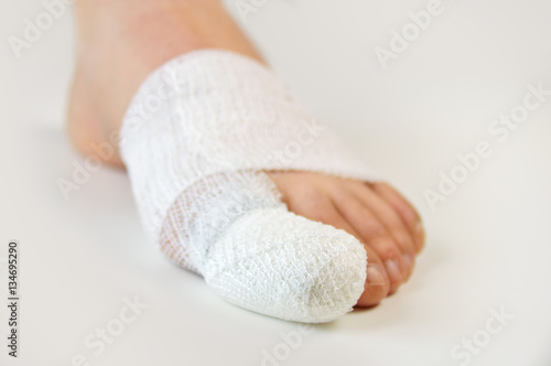 injured toe with bandages photo