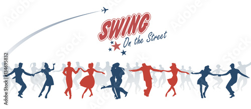 Group of young people dancing swing  lindy or rock n  roll on the street