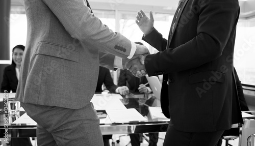 Business Partners Introductionary Handshake Bow photo