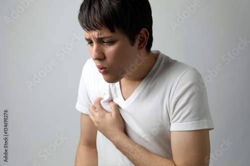 young man having a heart ache photo