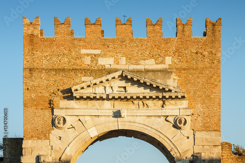 Arch of Augustus - ancient romanesque gate of the city, historical italian landmark, the most ancient roman arch that still stands intact, Rimini, Emilia-Romagna region, Italy.