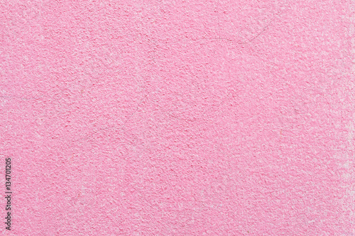 Closeup surface pink painted at the metal fence of house textured background