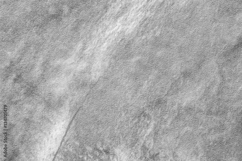 Closeup surface at stone pattern at stone brick wall in the garden textured background in black and white tone Closeup surface at stone pattern at stone brick wall in the garden textured background in black and white tone