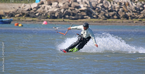 kitesurfer riding toeside