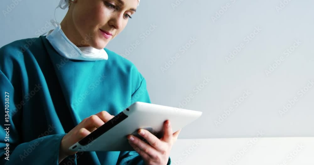 Female doctor using digital tablet at the hospital 4k Female doctor using digital tablet at the hospital 4k