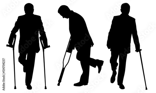 People with crutches isolated on white