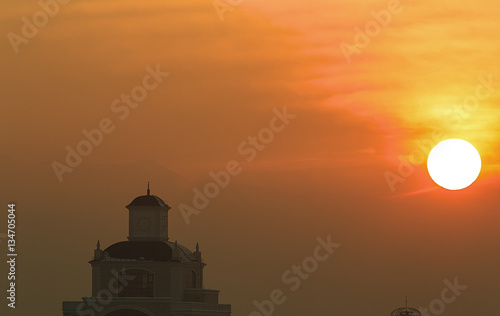 sunset over the city  a large sun  Kazakhstan  Almaty