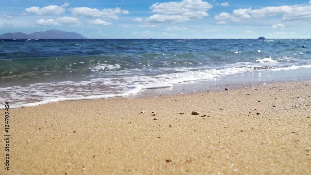 Waves of the sea on the sandy beach. Slow motion. Waves of the sea on the sandy beach. Slow motion.