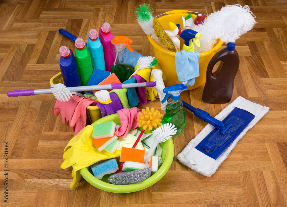 Cleaning supplies and equipment on floor