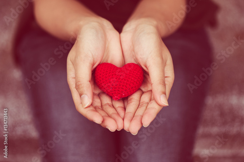 Giving heart and love in valentine's day photo