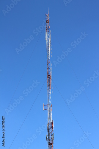 antenna repeater tower on blue sky