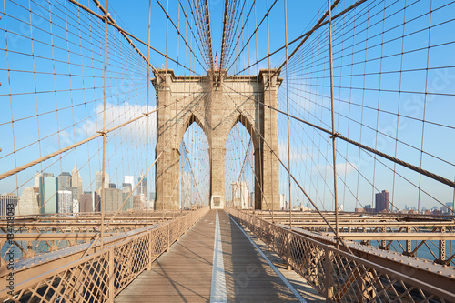 Empty Brooklyn Bridge, central perspective in the morning, New York
