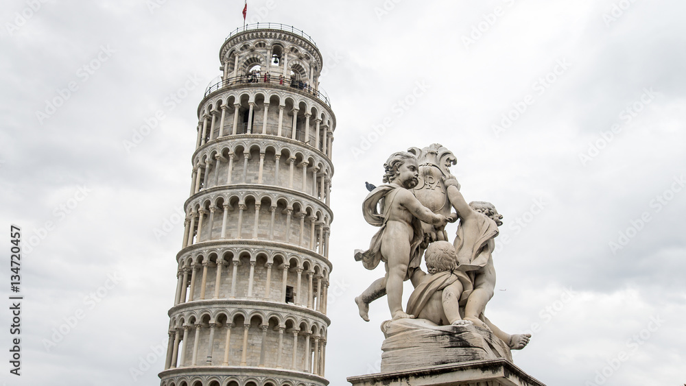 Pisa, Italy, - September 4, 2014: Pisa Leaning Tower with statue of angels, Pisa,  Italy