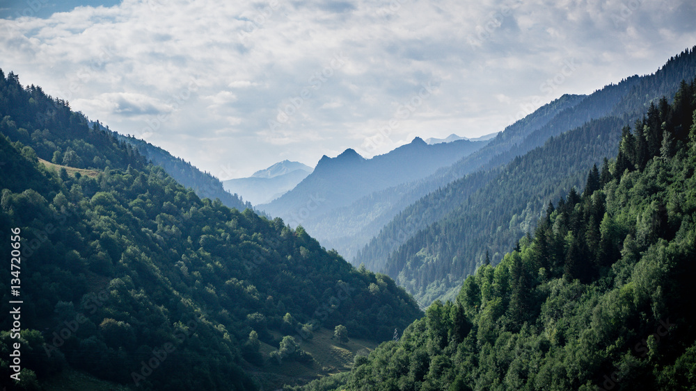 Obraz premium Ushguli, Georgia - August 2015: Small village looking at Greater Caucasus mountains in Ushguli region, Georgia