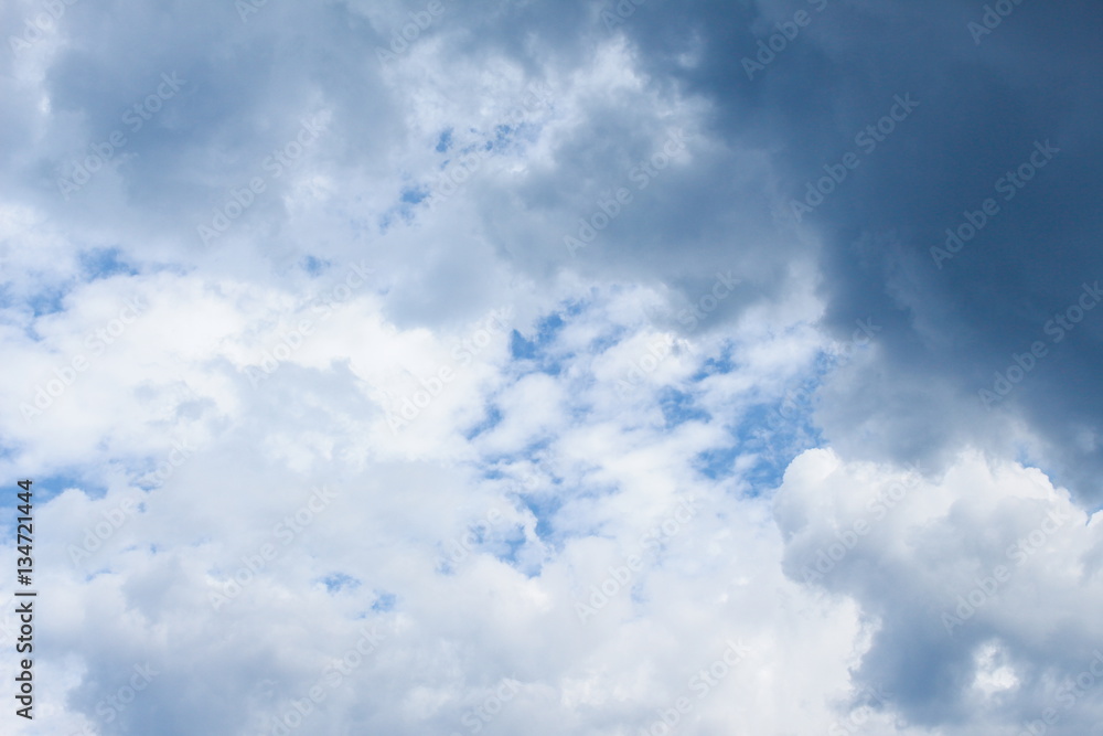 blue sky with big white cloud, and motion raincloud  in  nature