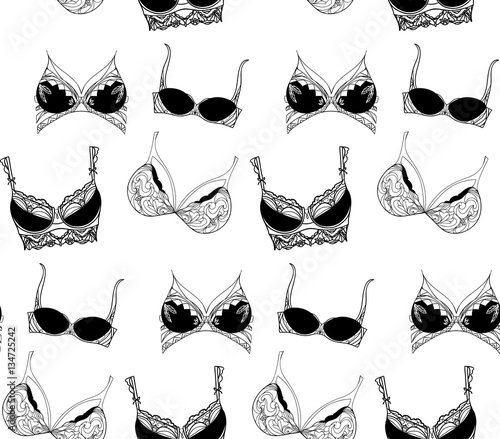 Seamless texture with black women lace bra. Vector background for your creativity