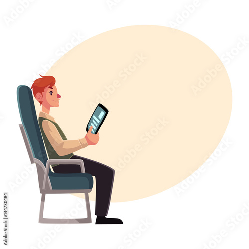 Young man seating in airplane, economy class, holding a tablet or e-book, cartoon vector on background with place for text. Man seating in economy class, airplane passenger, holding tablet, side view