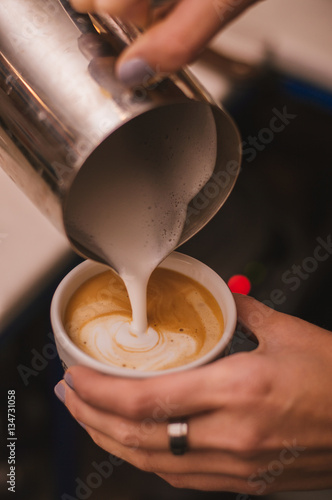 Coffee latte art making by barista