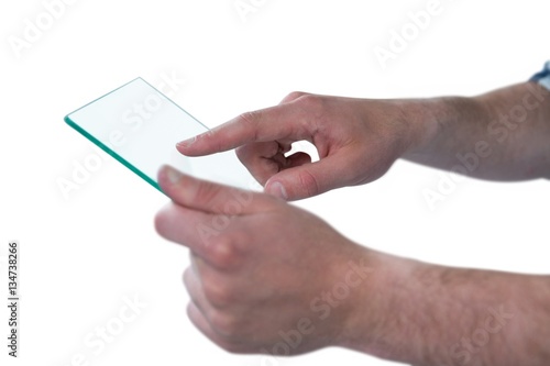Man pretending to be using futuristic digital tablet