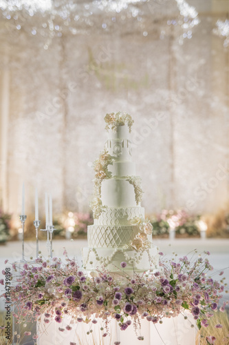 White wedding cake with flower