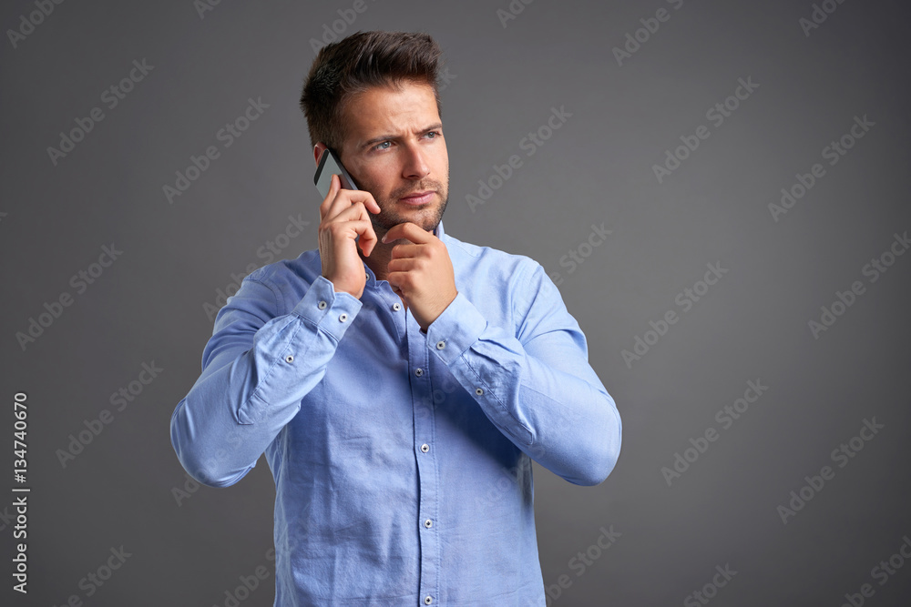 Young man with a smartphone Young man with a smartphone