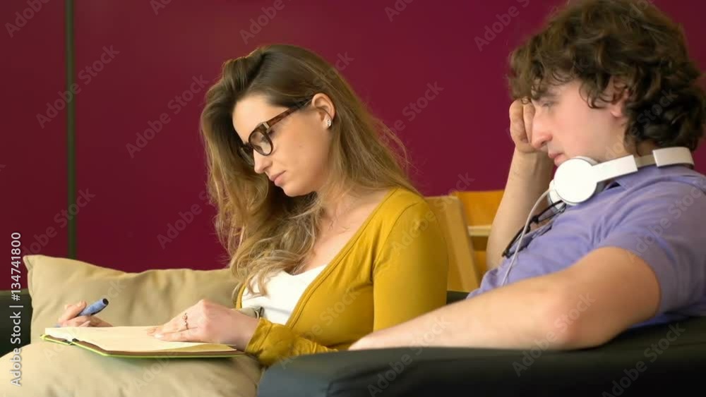 Couple sitting on the sofa and quarrel with each other
Couple sitting on the sofa and quarrel with each other