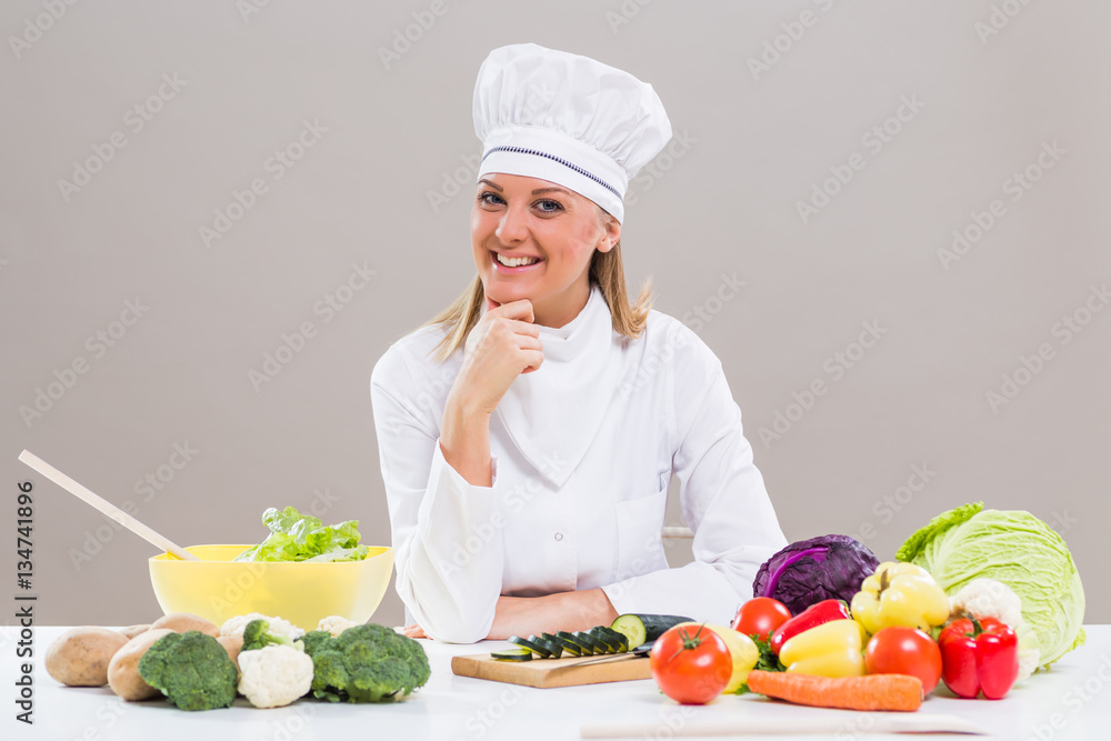 Portrait of female chef making healthy meal Portrait of female chef making healthy meal