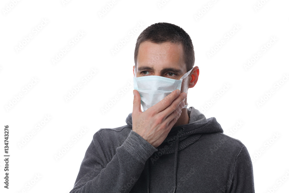 Portrait of man wearing facial hygienic mask outdoors. Ecology, air pollution, Environmental awareness and virus protection concept Portrait of man wearing facial hygienic mask outdoors. Ecology, air pollution, Environmental awareness and virus protection concept