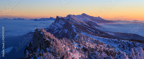 Obraz na plátně Snow covered mountainrange, Vercors, France, during a winter sunrise