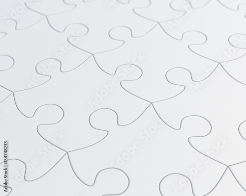 White jigsaw puzzle background closeup. 3d rendering