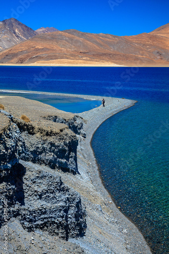 a beautiful mountain range naer pangong lake and a clearly sky
