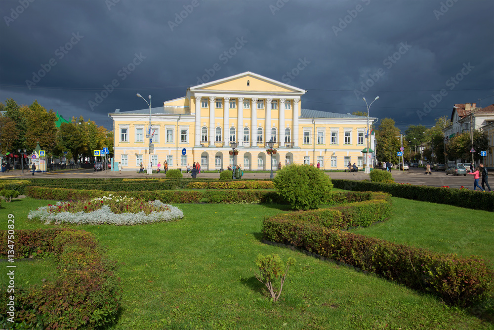 The old mansion of senator Borshchov on the Susaninskaya square under stormy sky. Kostroma