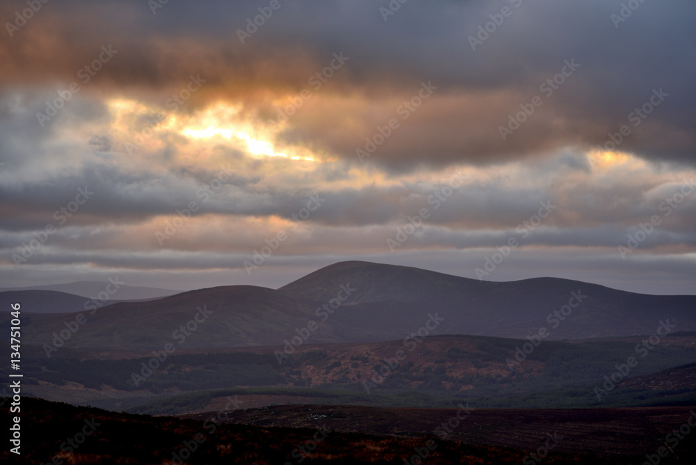 sunset over the Mullaghcleevaun mountain - Ireland sunset over the Mullaghcleevaun mountain - Ireland