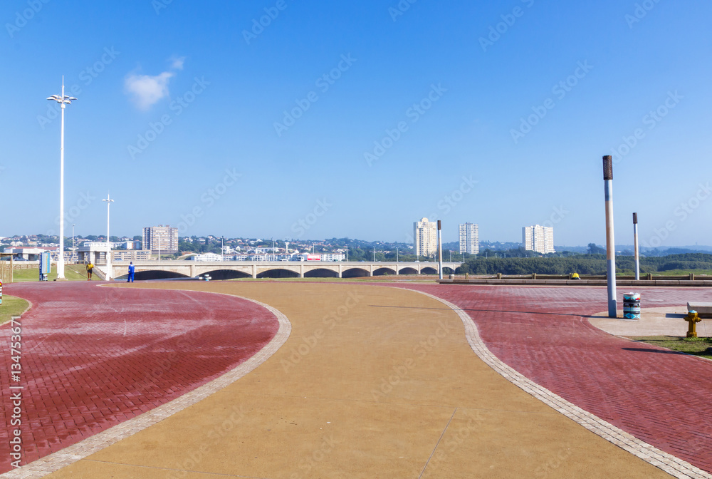 Fototapeta premium Beachfront Promenade Against Mgeni River Bridge and Blue Skylin
