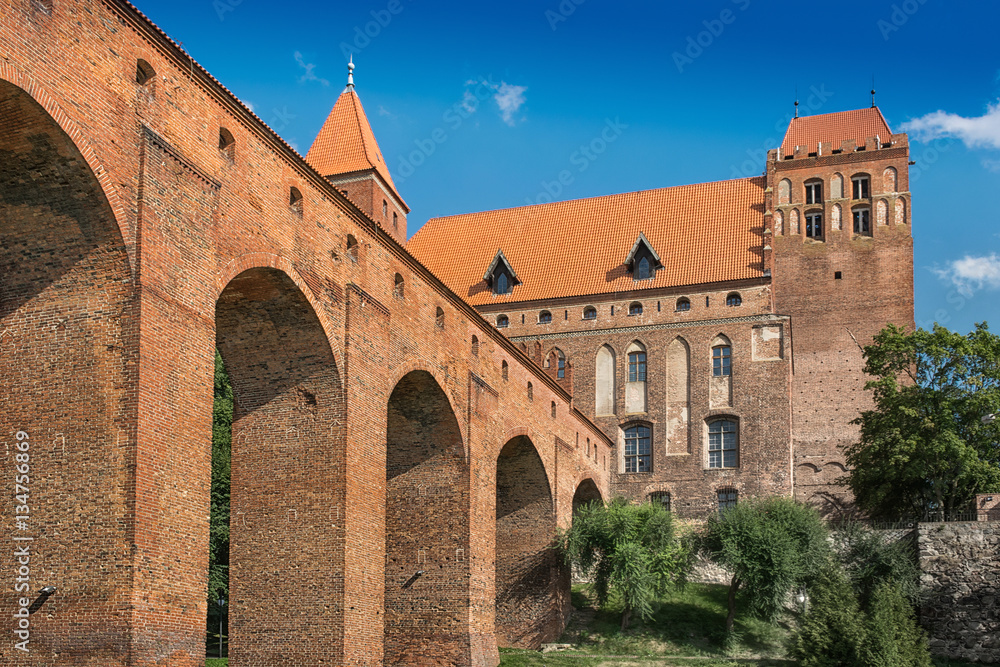 Kwidzyn, Poland - August 10, 2014: 14th century brick gothic castle of the Teutonic Order. Horizontal image in a sunny day..