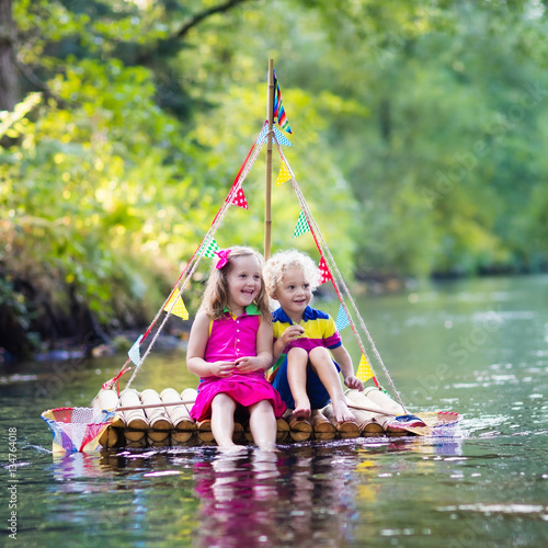 Kids on wooden raft