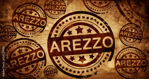 Arezzo, vintage stamp on paper background © Argus