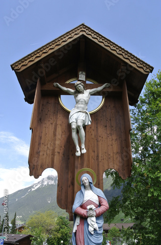 grosses kruzifix mit madonna auf dem friedhof von neustift im stubaital photo