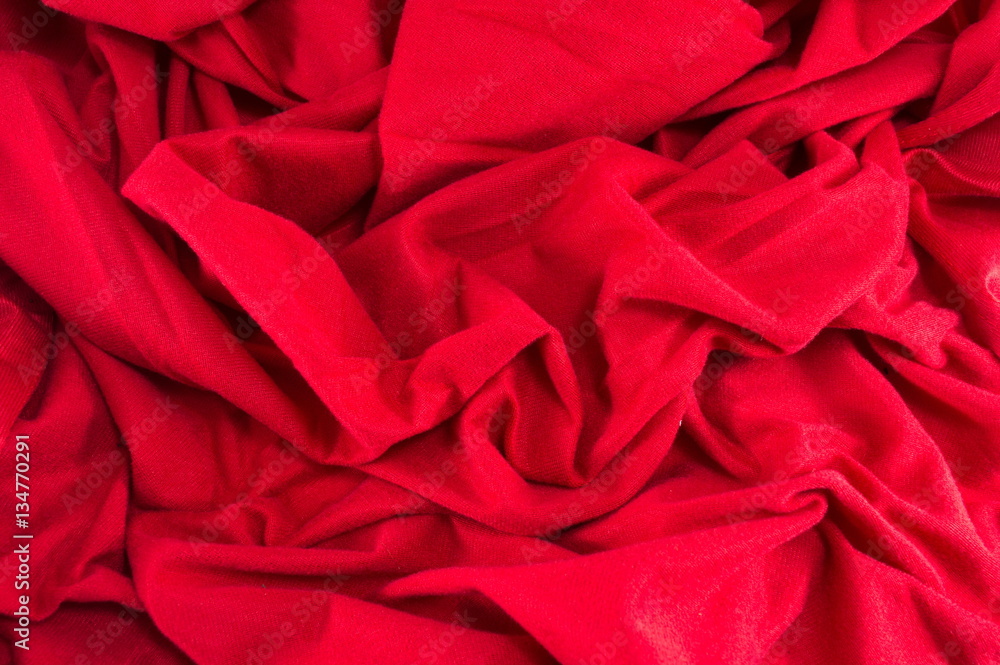 Red wrinkled fabric background Red wrinkled fabric background