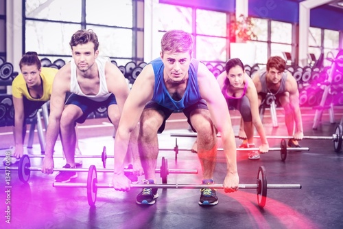 Portrait of athletic men and women working out