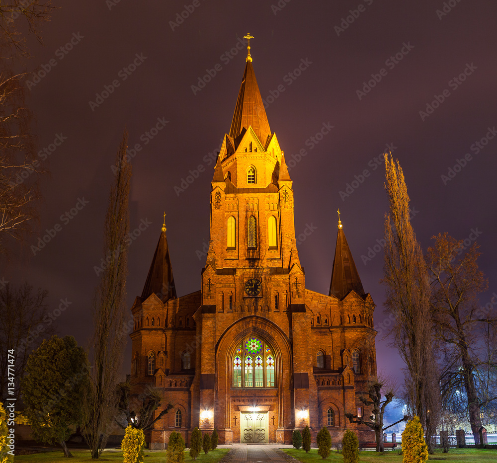St. Peter church in Tartu, Estonia. Old brick church at night.