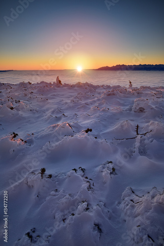 Sun under the clouds covered Tatra mountain peaks