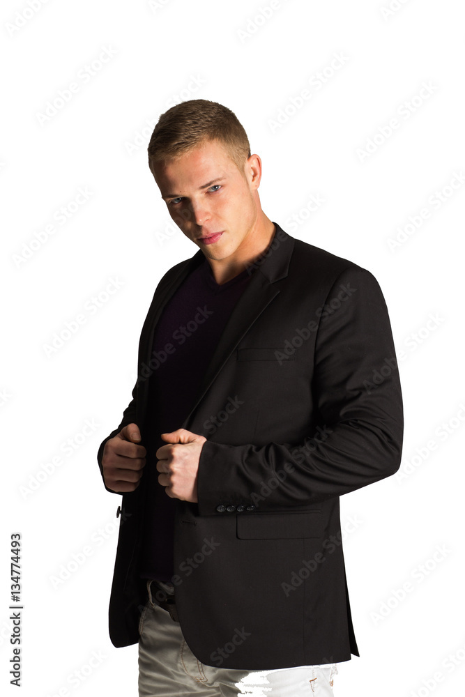 Young handsome man in black suit and jeans smiling, isolated on Young handsome man in black suit and jeans smiling, isolated on