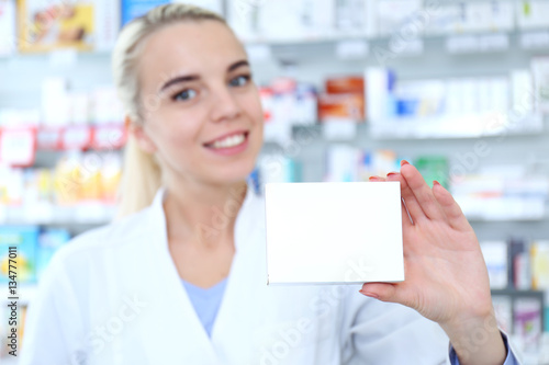 Female shop assistant with ...