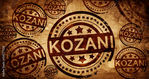 Kozani, vintage stamp on paper background