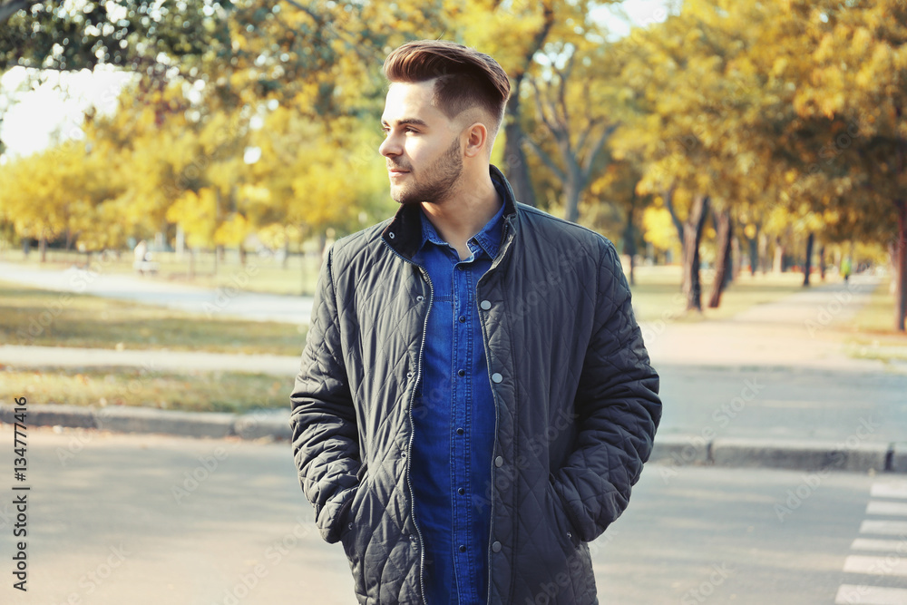 Handsome man on street background Handsome man on street background