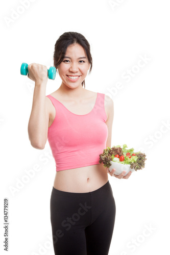 Beautiful Asian healthy girl with dumbbell and salad. © halfbottle