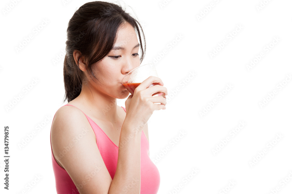 Beautiful healthy Asian girl drink tomato juice. Beautiful healthy Asian girl drink tomato juice.